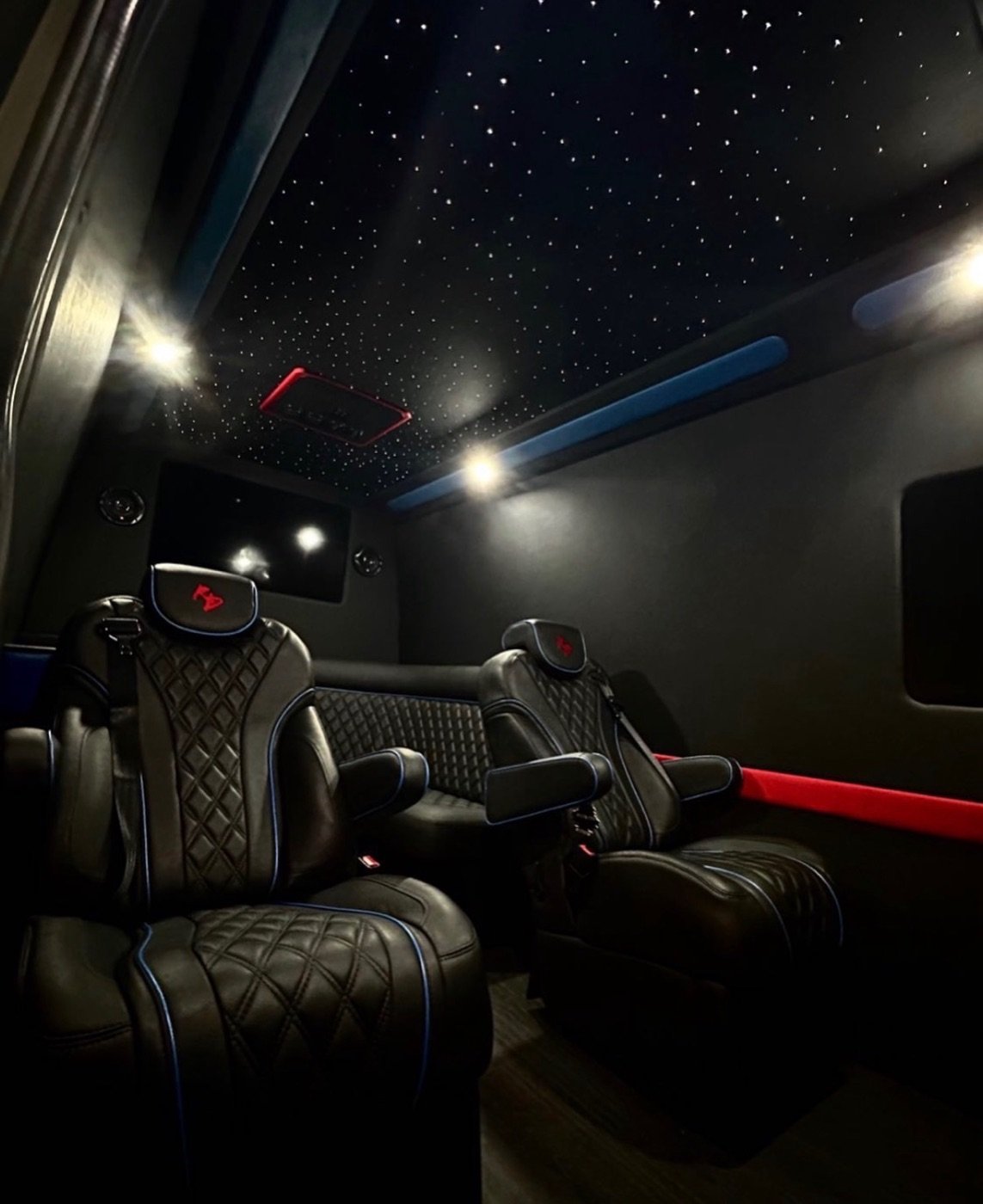 Quilted leather captain seats under a fiber-optic ceiling